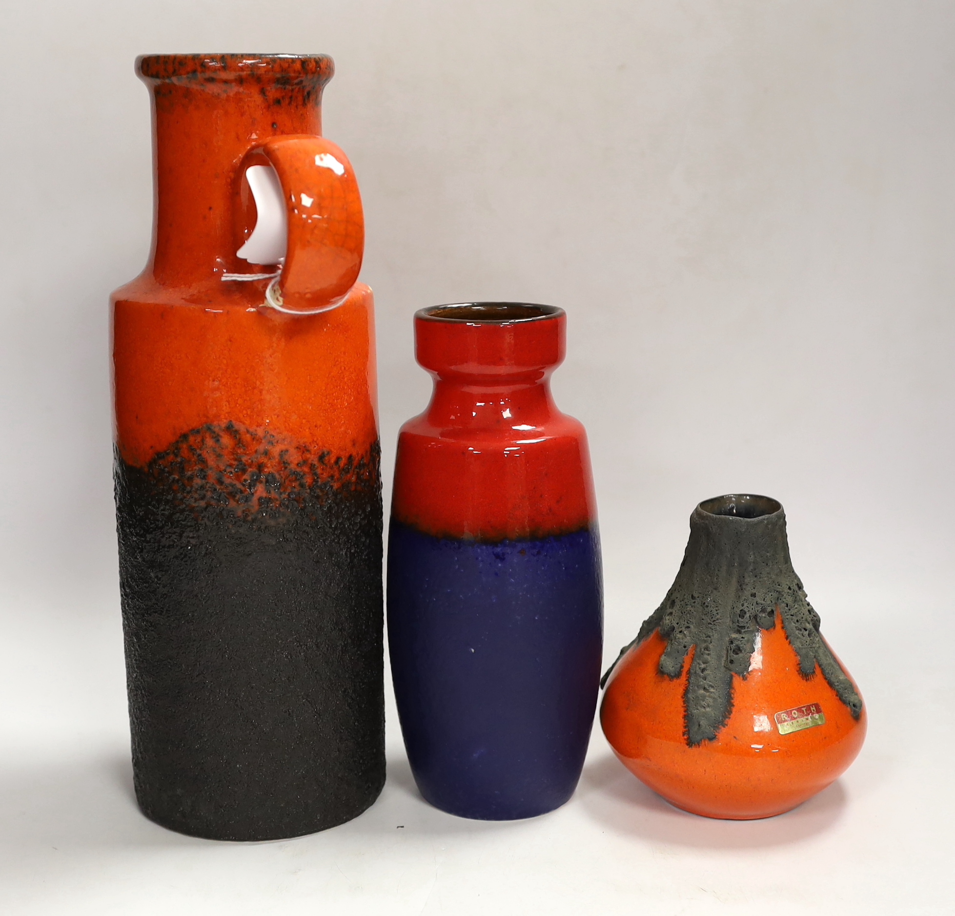 Three West German pottery items including a Scheurich vase and a Roth Keramik volcanic lava glaze, tallest 28cm
